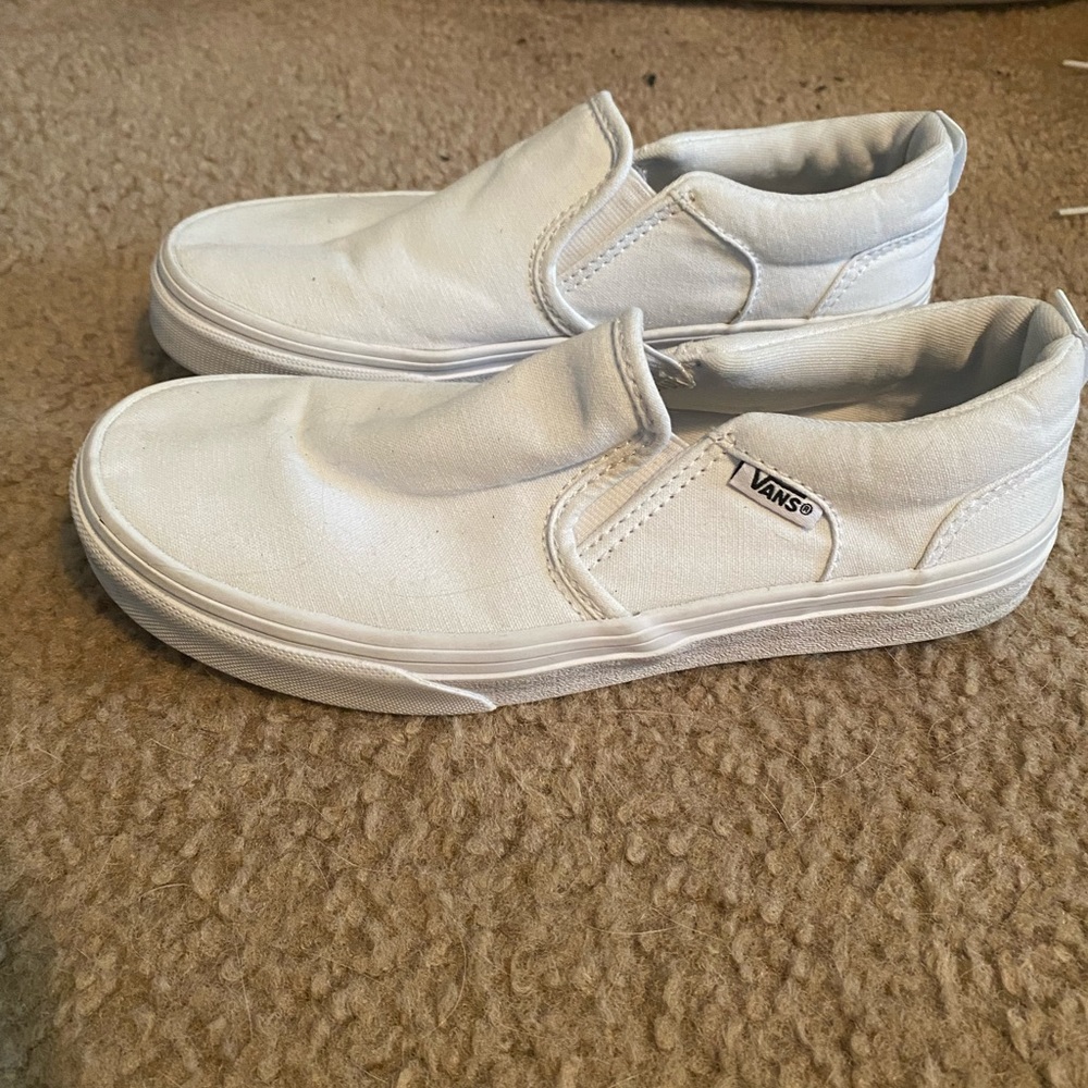 White vans, gently used, small spot on top left indicated on picture.